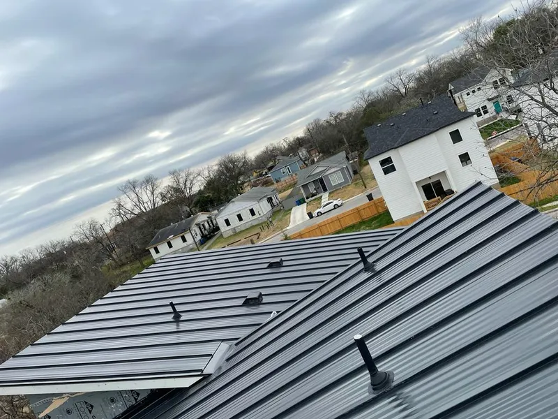 Standing seam metal roof panels with vents for Skylight Repair in Clemmons